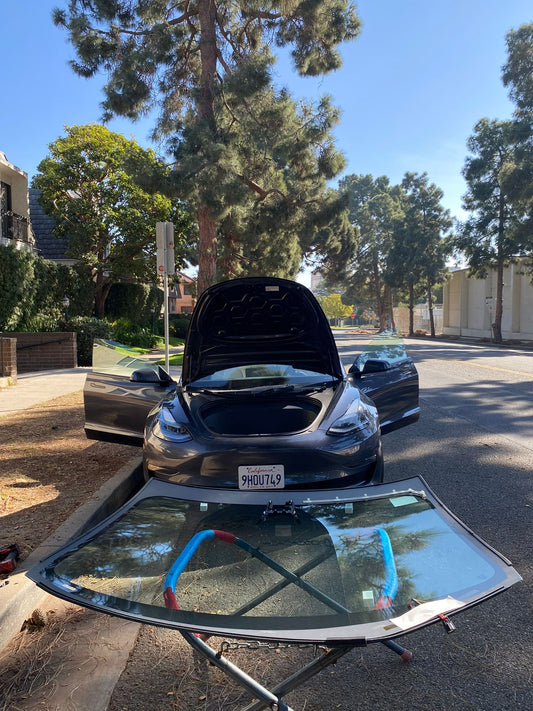auto glass technician installing windshield in Los Angeles - mobile service